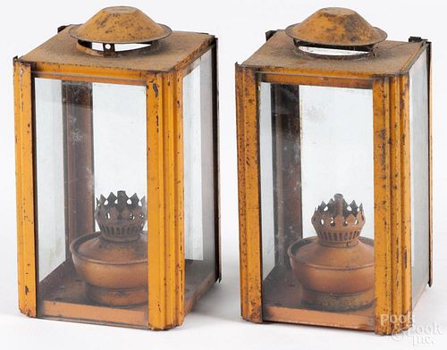 Pair of painted tin lanterns, 19th c., 8'' h. Provenance: DeHoogh Gallery, Philadelphia.