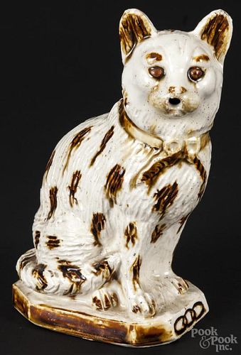 Ceramic figure of a cat, late 19th c., the base decorated with an Oddfellows' chain, 7 3/4'' h.