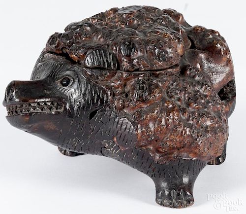 Carved burl knot dresser box in the form of a hedgehog, 6'' h., 9'' w.