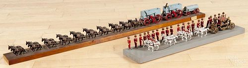 Wood and plastic English royal coach model, 22 1/4'' l., together with a horsedrawn wagon train