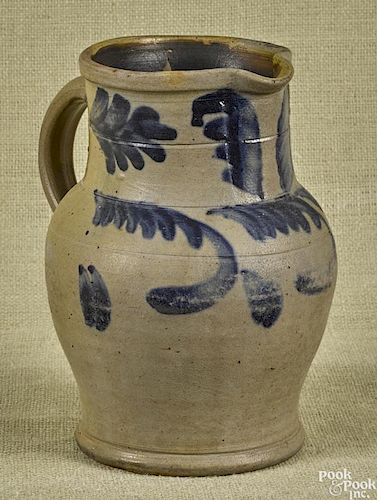 Pennsylvania stoneware pitcher, 19th c., with cobalt foliate decoration, 10'' h.
