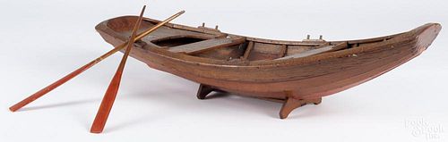 Wood lifeboat model, early 20th c., 31 1/4'' l. Provenance: DeHoogh Gallery, Philadelphia.