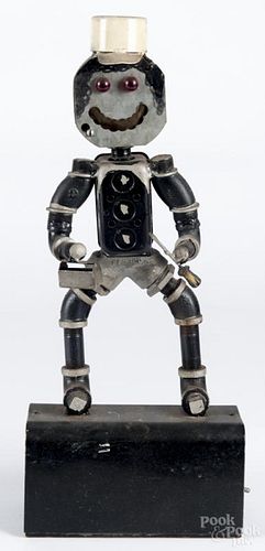 Folk art figure constructed from pipe fittings, electric sockets, etc., 21'' h.
