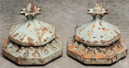 Pair of cast iron architectural caps, 19th c., 11'' h., 11 1/2'' w.