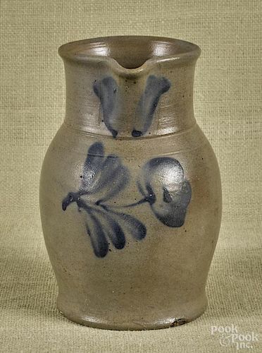 Pennsylvania salt glazed stoneware pitcher, 19th c., with cobalt floral decoration, 9 1/4'' h.