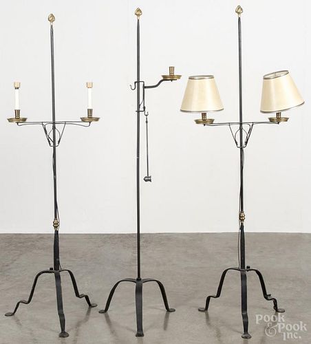 Three reproduction wrought iron candlestands, tallest - 59''.