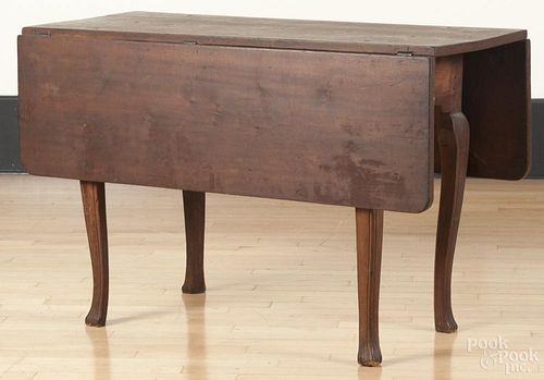 Queen Anne style stained cherry drop leaf dining table, 19th c., 29'' h., 19 1/2'' w., 45 3/4'' d.