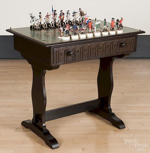 Jacobean style oak chess table with a pewter American Revolution chess set, by Charles Stadden