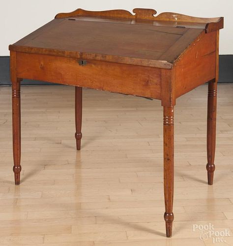 Pennsylvania stained cherry schoolmaster's desk, ca. 1830, 35'' h., 36 1/2'' w.
