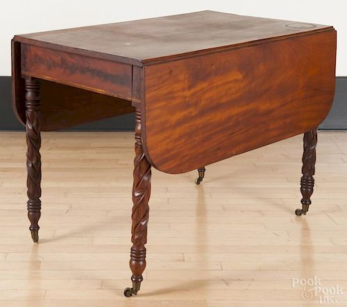Empire mahogany Pembroke table, ca. 1840, with carved legs, 29'' h., 25 1/4'' w., 39 3/4'' d.