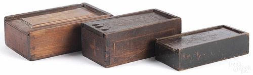 Cherry slide lid box, 19th c., together with a walnut box and a small mahogany box