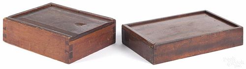 Mahogany slide lid box, 19th c., 1 3/4'' h., 9'' w., 5 1/2'' d., together with a stained pine slide lid