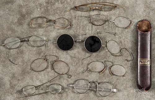 Early spectacles, to include a 14K gold example.