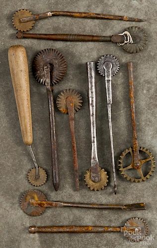 Ten iron and brass jagging wheels, 19th c.