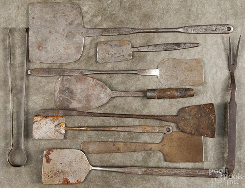 Wrought iron utensils, 19th c., to include spatulas, tongs, etc.