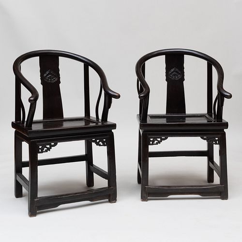 Pair of Chinese Ebonized Horseshoe Back Armchairs