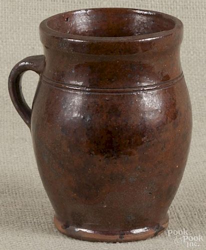 Pennsylvania redware jar, 19th c., 5 1/2'' h.