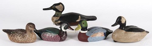 Five contemporary carved and painted duck decoys, one signed Bryant
