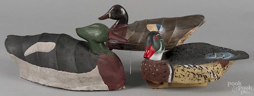 Two contemporary canvas covered duck decoys, longest - 16 1/2'', together with a L. L. Bean cork body