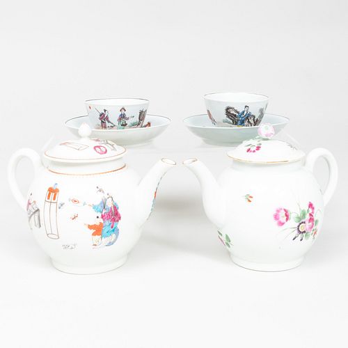 Two Small Worcester Porcelain Teapots and Two Transfer Printed and Enriched Teabowls and Saucers 