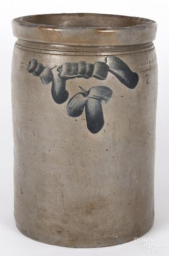 Pennsylvania two-gallon stoneware crock, 19th c., with blue floral swag decoration, stamped