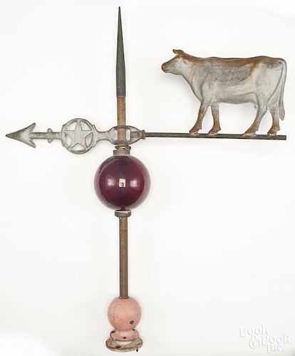Zinc cow weathervane, early 20th c., with a lighting ball and rod, 27'' h.