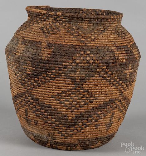 Southwest Native American coiled basketry olla, early 20th c., 14'' h.