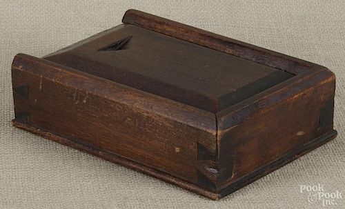 Pennsylvania walnut slide lid box, 19th/20th c., with a compartmentalized interior, 2 1/2'' h.