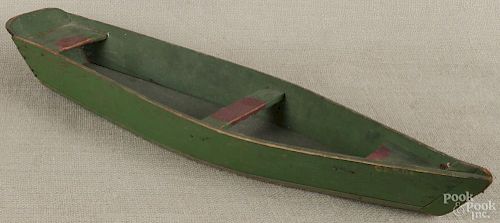 American carved and painted folk art rowboat, 19th c., retaining original green surface