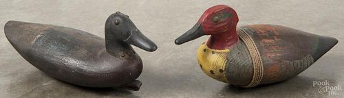 Two carved and painted duck decoys, 19th c., to include one signed CT Wilson, 12'' l.
