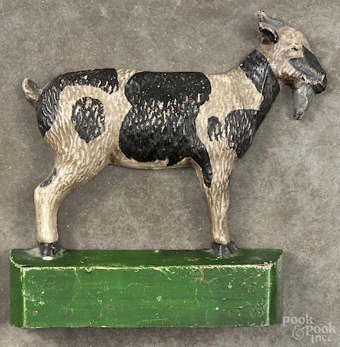 Painted cast iron goat doorstop, late 19th c., 8 1/2'' h., 7 1/2'' w.