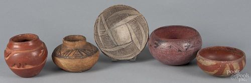 Five pieces of Native American pottery, 19th/early 20th c., tallest - 4 1/2''.