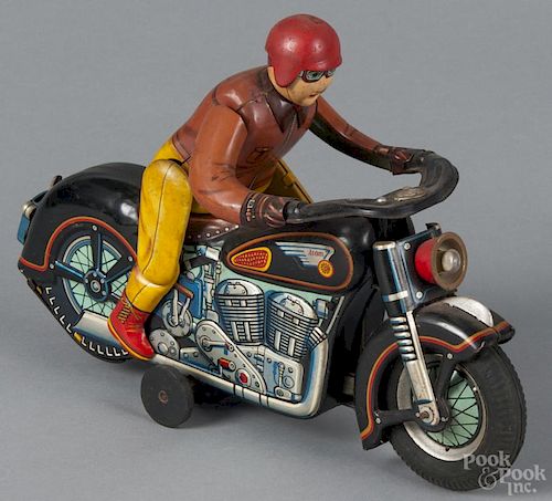 Japanese lithograph tin Atom motorcycle toy, 7 3/4'' h., 11 1/2'' w.