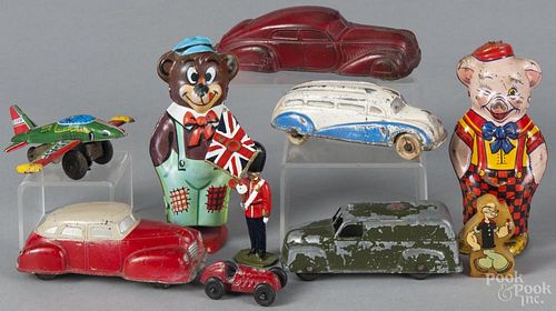 Toys, to include a Chein wind-up bear and pig, a tootsie toy ambulance, a Pop-eye pencil sharpener