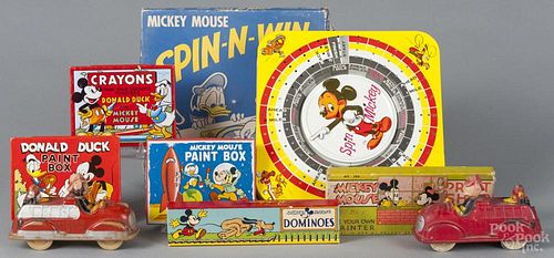 Vintage Mickey mouse toys, to include two rubber Fire Department trucks, a Spin-N-Win game, dominoes