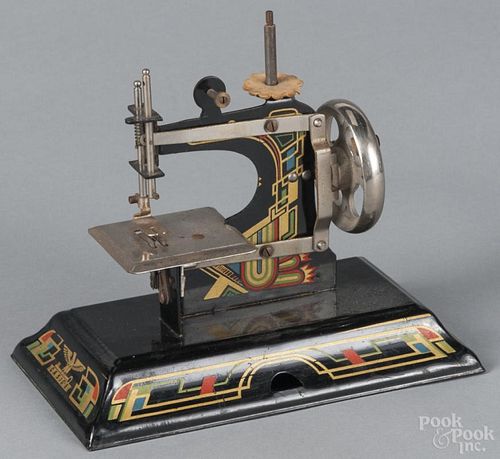Casige toy sewing machine, 8 1/2'' l.