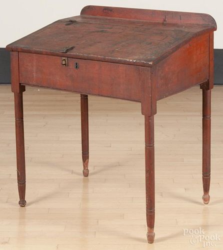 Pennsylvania Sheraton pine schoolmaster's desk, 19th c., retaining an old red surface, 35'' h.