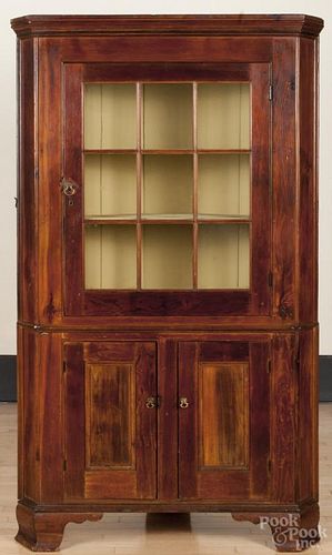 Pine one-piece corner cupboard, early 19th c., 78 1/2'' h., 45'' w.