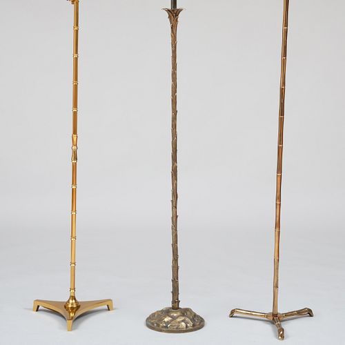 Two Brass Faux Bamboo Floor Lamps and a Bronze Faux Palm Frond Floor Lamp