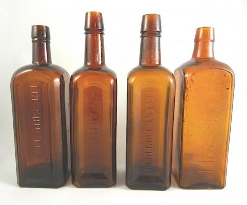 Miscellaneous - 4 amber square bottles