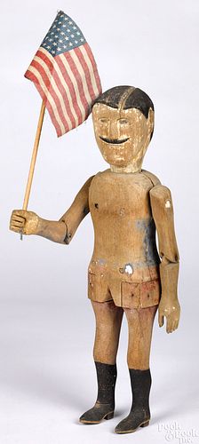 Carved and painted articulated figure of a man