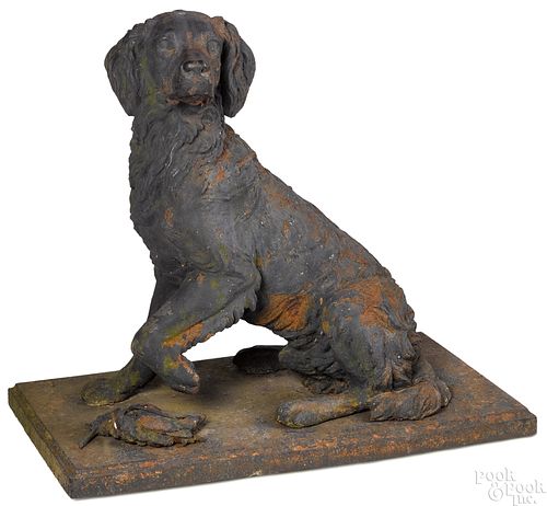 Cast iron garden statue of a setter and woodcock