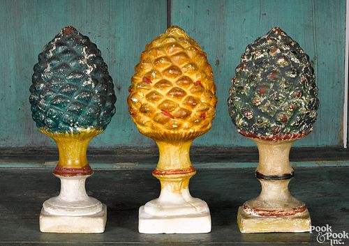 Three Pennsylvania chalkware pineapple garnitures