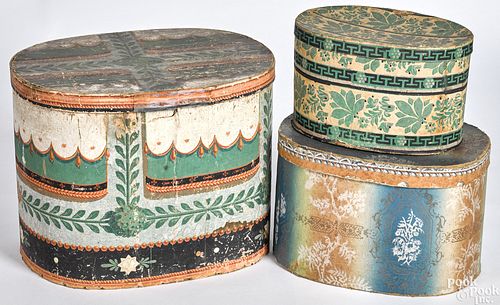 Three wallpaper hat boxes 19th c.