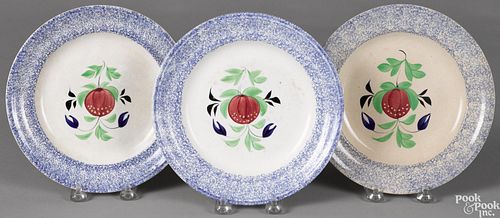 Three blue spatter pomegranate plates