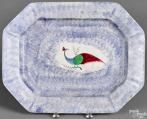 Blue spatter platter, with peafowl