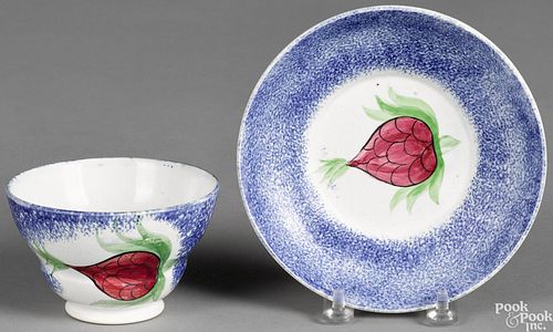 Blue spatter cup and saucer, with fruit variant