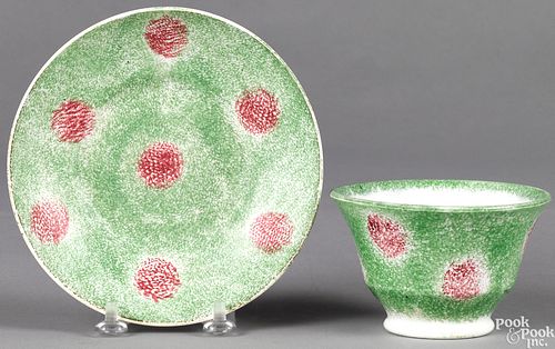 Green and red spatter cup and saucer
