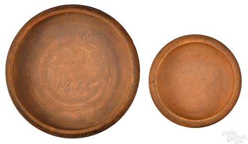Two Pennsylvania redware plate molds
