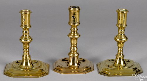 Three Queen Anne brass candlesticks